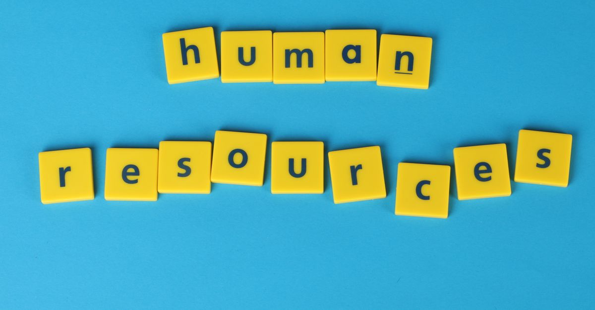 Yellow tiles spelling 'human resources' on a blue background, ideal for HR or business concepts.